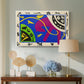 Canvas art print featuring an expressive abstract scene with symbolic circus-like figures, displayed above a styled console table