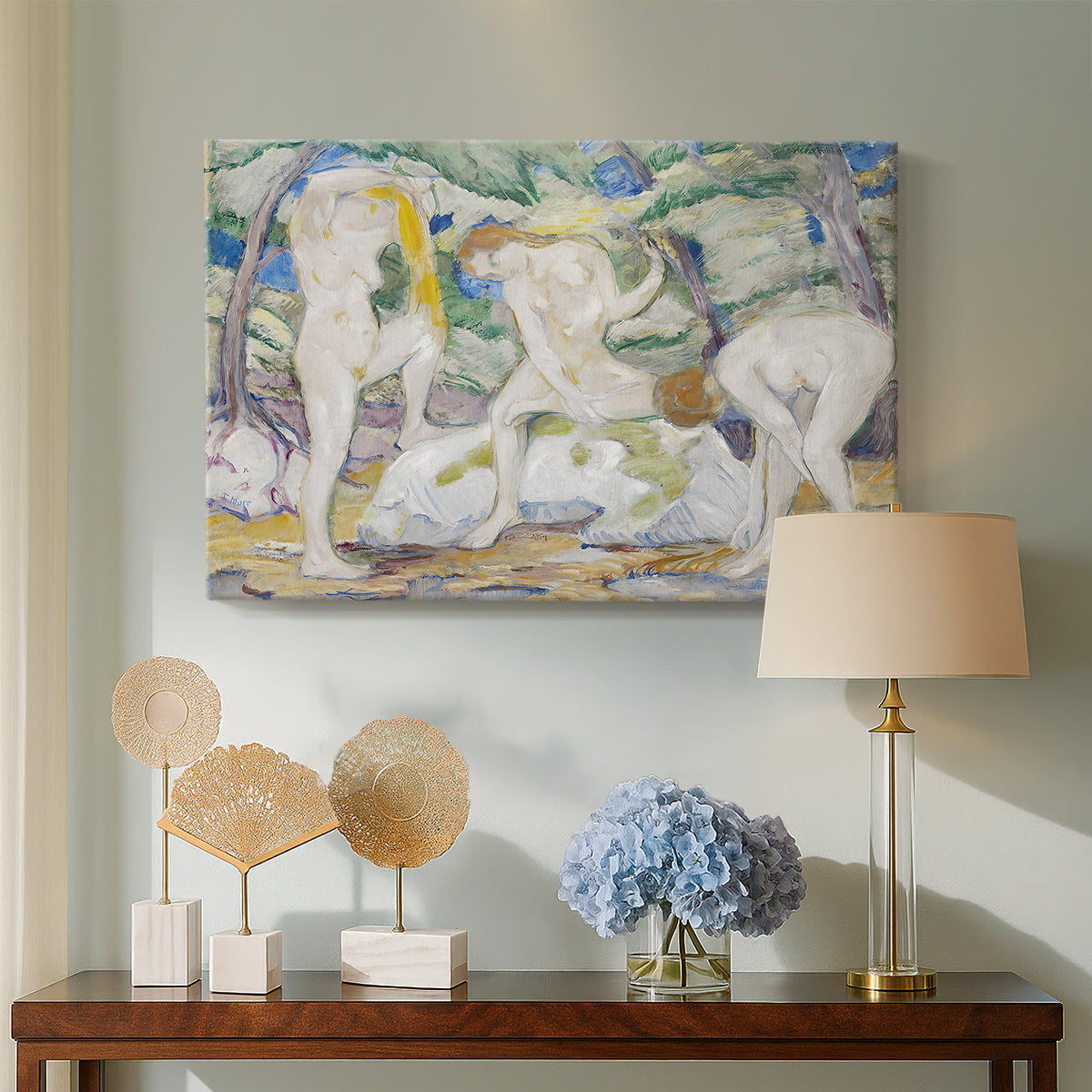 Canvas art print featuring a stylized depiction of bathers with bold colors and simplified shapes, displayed above a styled console table