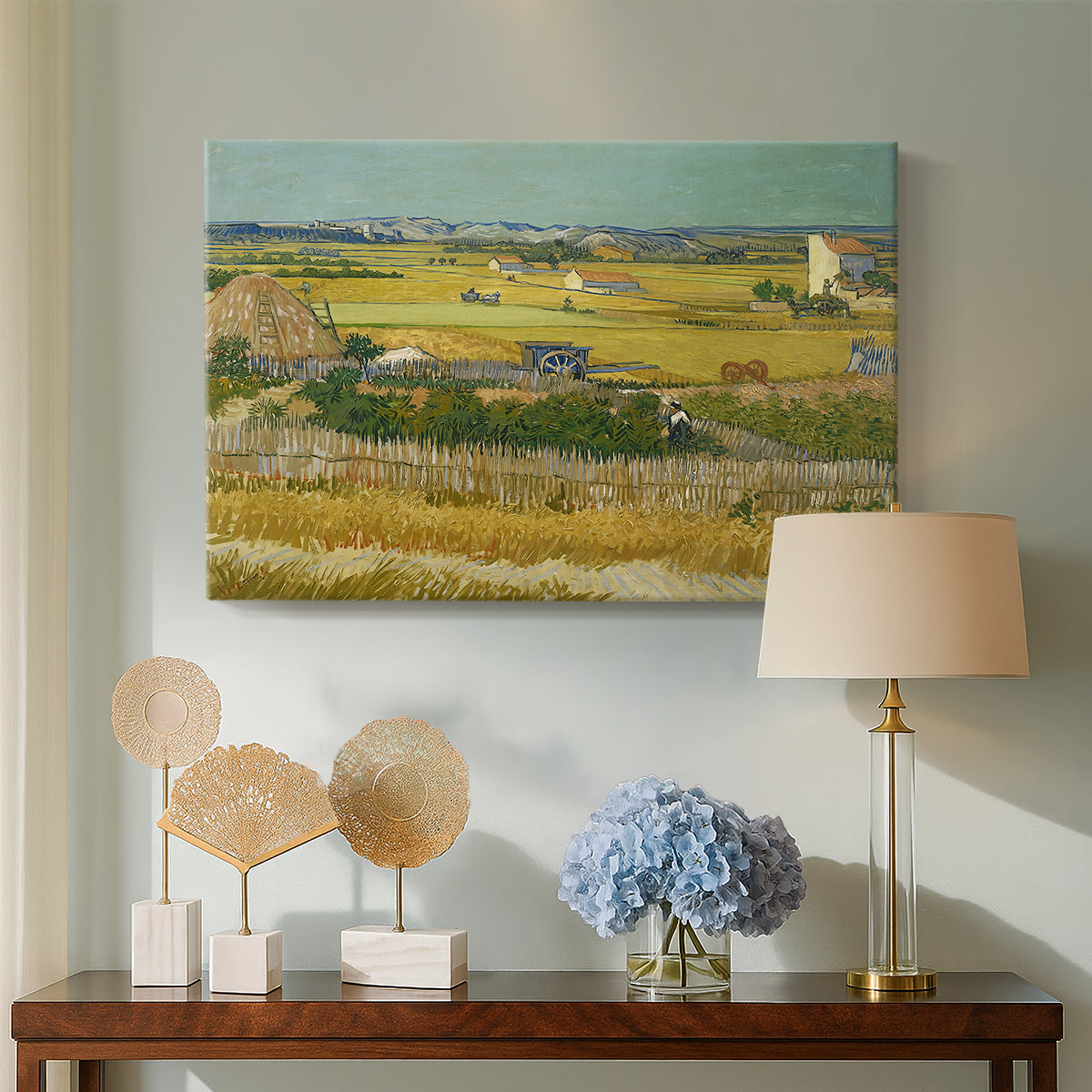 Canvas art print featuring an expressive landscape combining figures and farmland, displayed above a styled console table