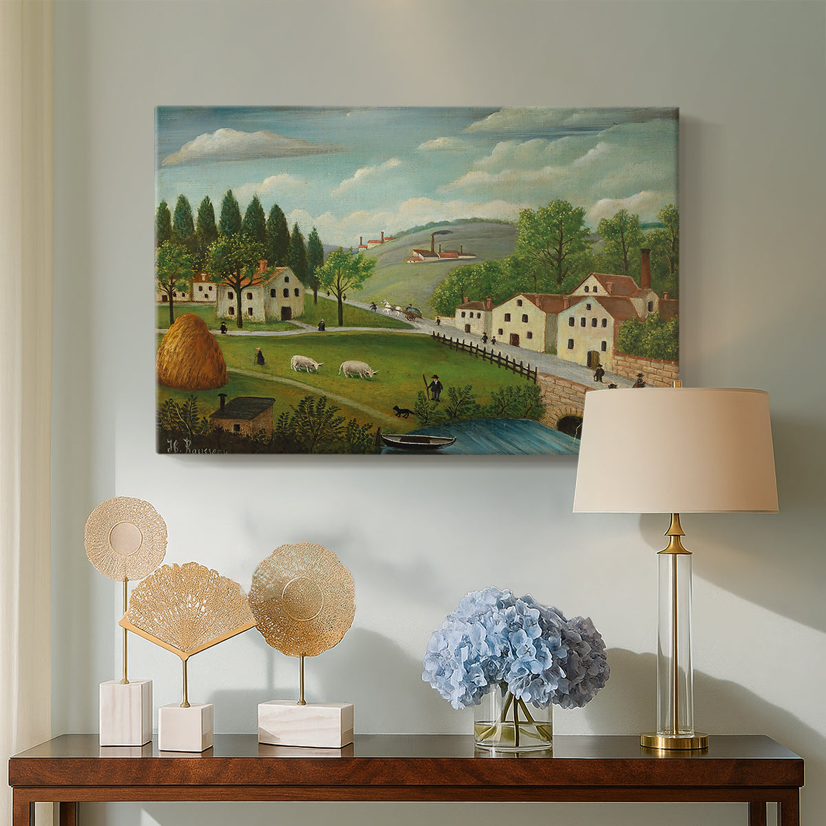 Canvas art print featuring a pastoral setting with water, figures, and greenery, displayed above a styled console table