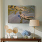 Canvas art print featuring an impressionist depiction near water, displayed above a styled console table