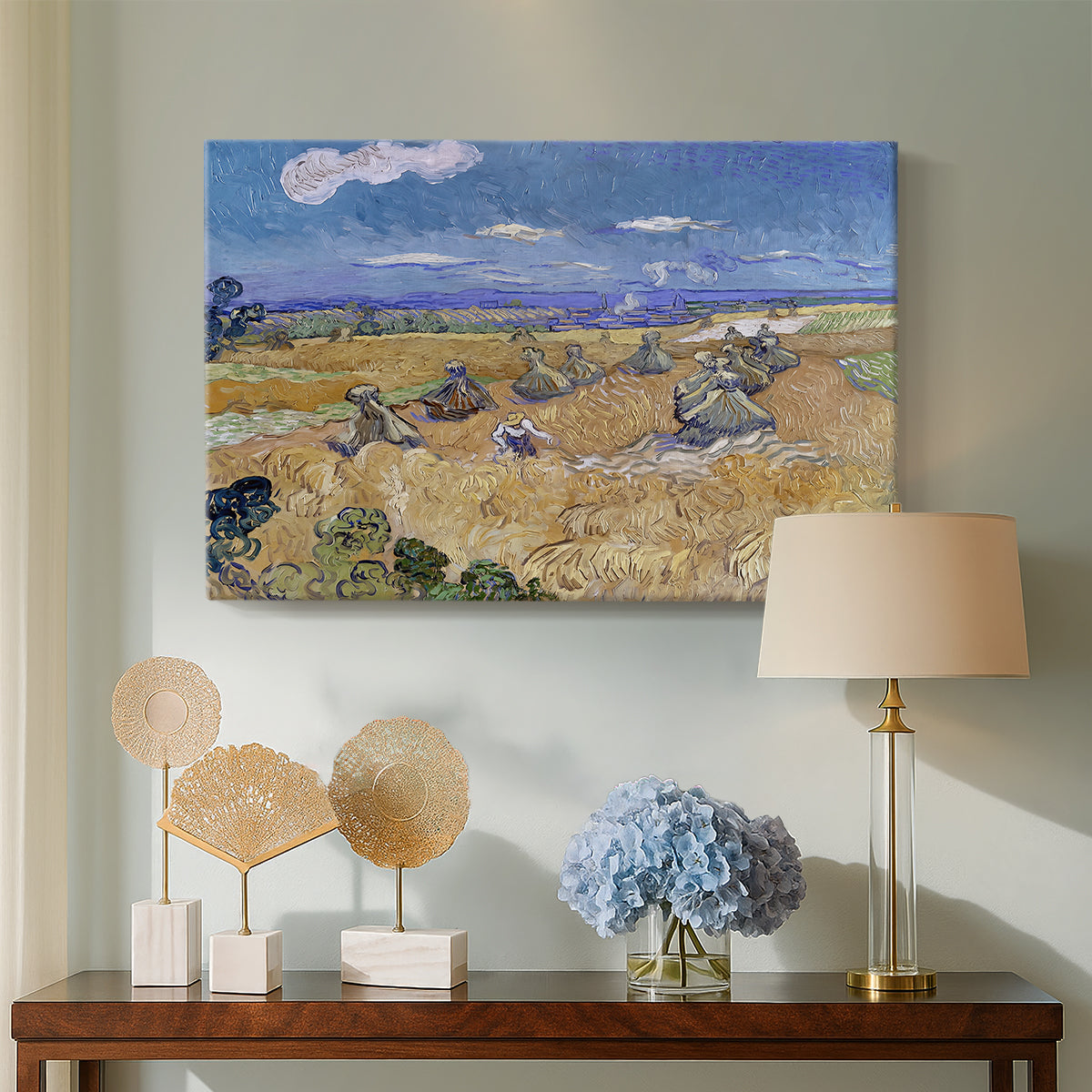 Canvas art print featuring an expressive landscape combining figure and agriculture, displayed above a styled console table