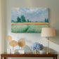 Canvas art print featuring an agricultural landscape with tall wheat and distant horizon, displayed above a styled console table