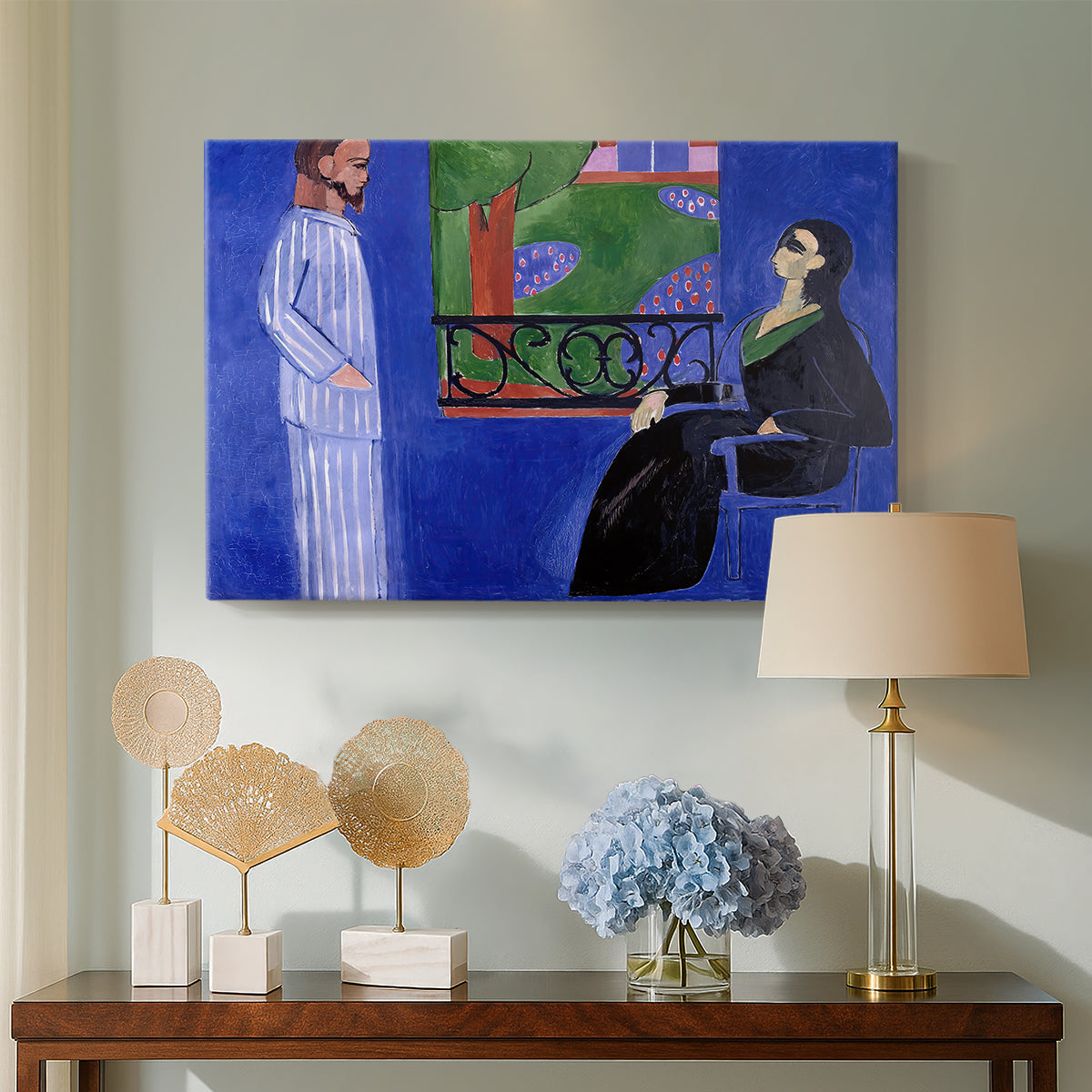Canvas art print featuring a stylized interior portrait of two people in dialogue, displayed above a styled console table