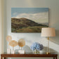 Canvas art print featuring a scenic landscape of Ekeberg hills with Oslo church and expansive sky, displayed above a styled console table