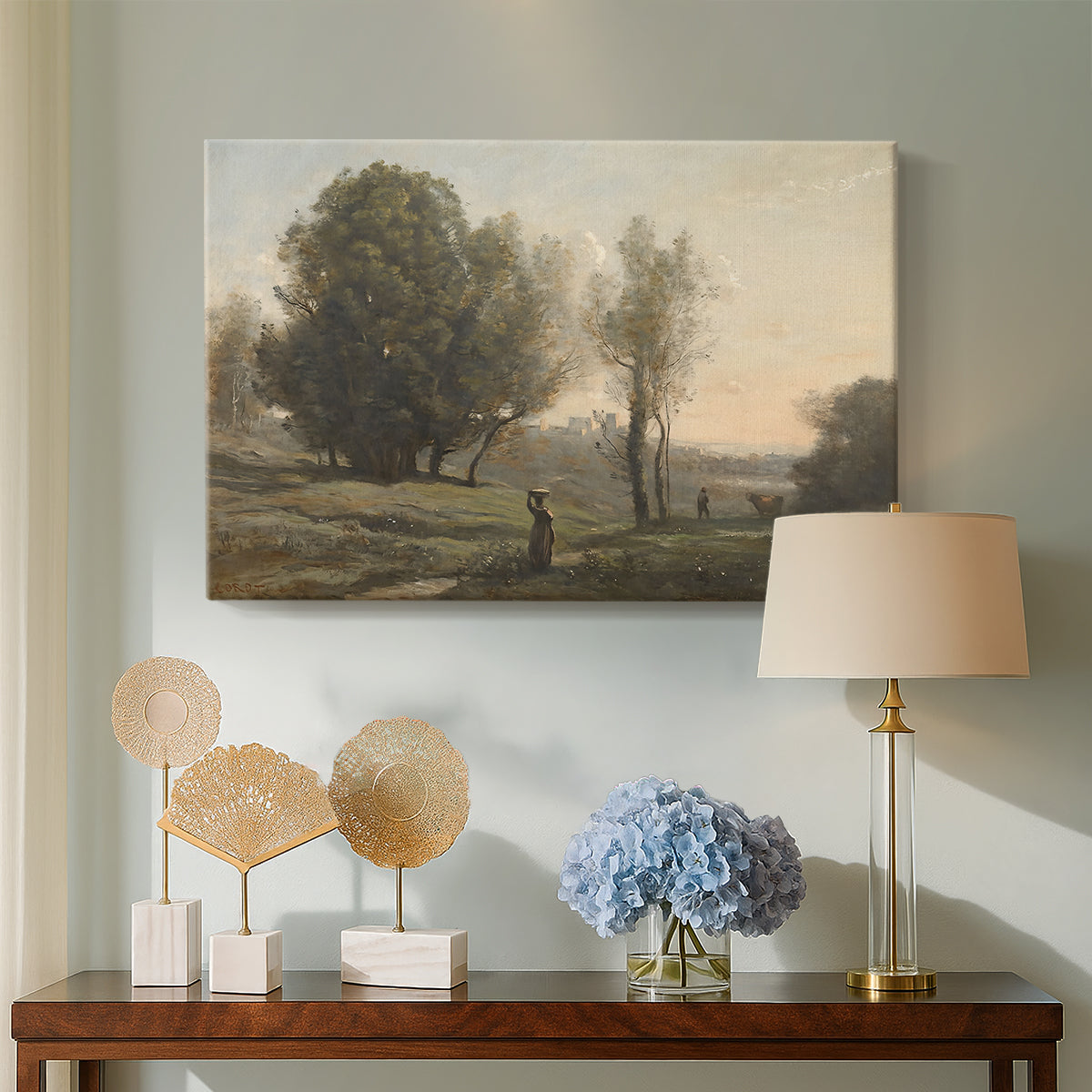 Canvas art print featuring a tranquil landscape with distant horizon and soft tones, displayed above a styled console table
