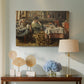 Canvas art print featuring a rustic interior with people eating together at table, displayed above a styled console table