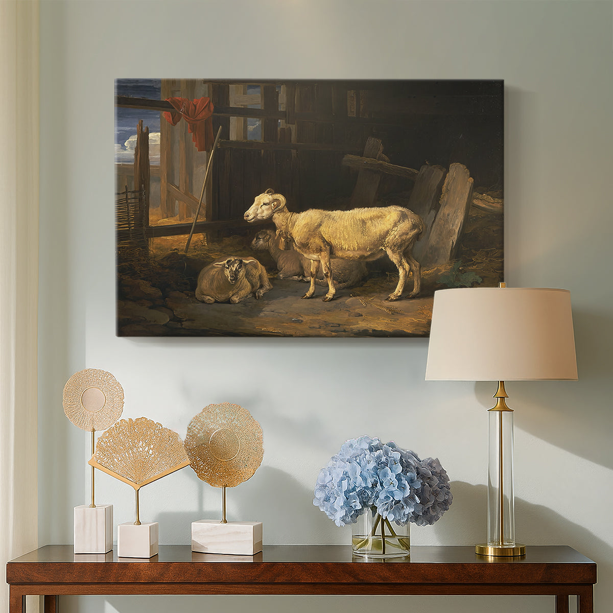 Canvas art print featuring an interior scene with sheep in agricultural setting, displayed above a styled console table