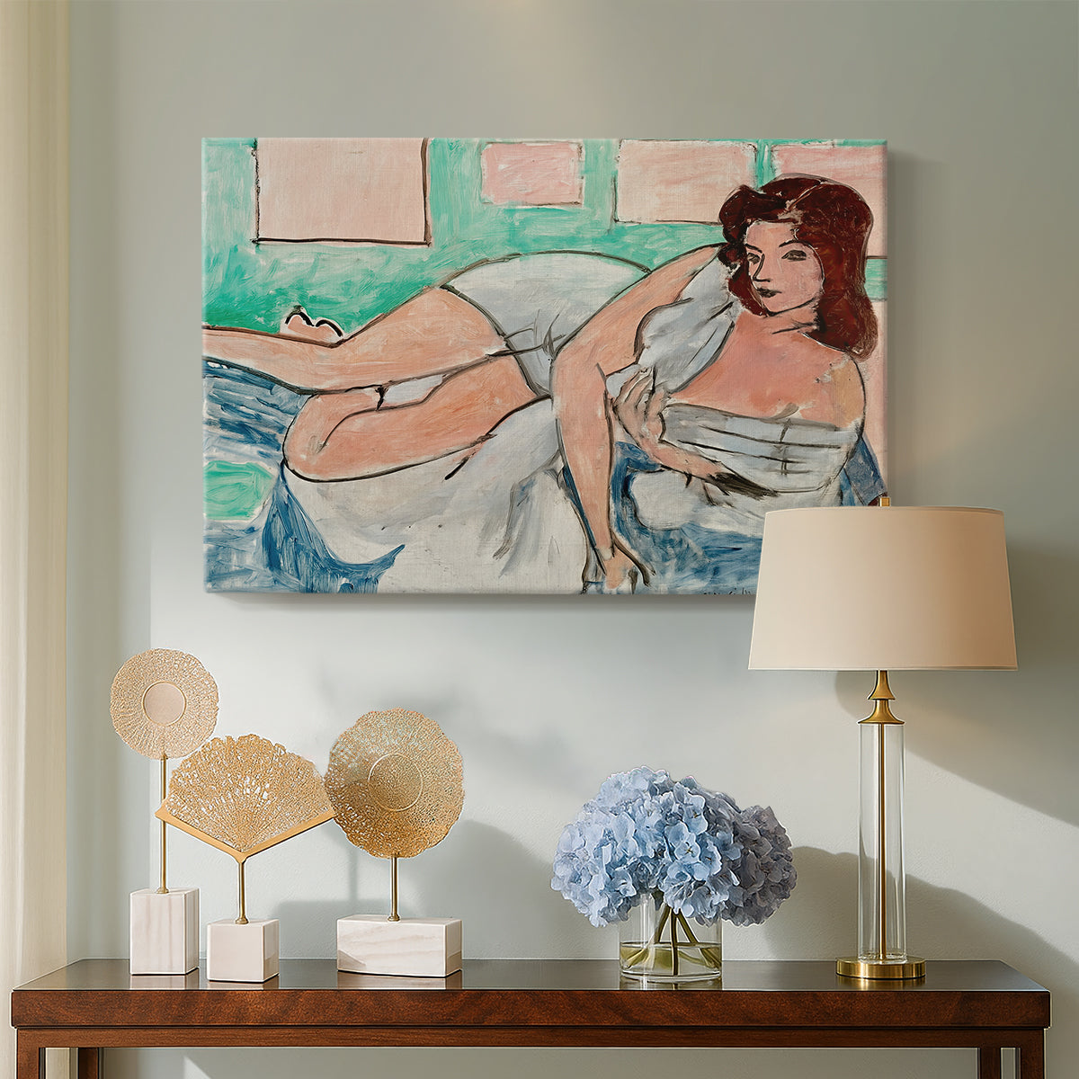 Canvas art print featuring a Fauvist figure study of a woman resting indoors, displayed above a styled console table