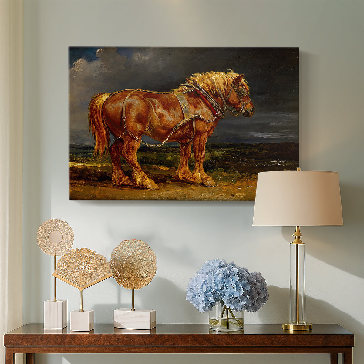 Canvas art print featuring a realistic depiction of working horse in natural terrain, displayed above a styled console table
