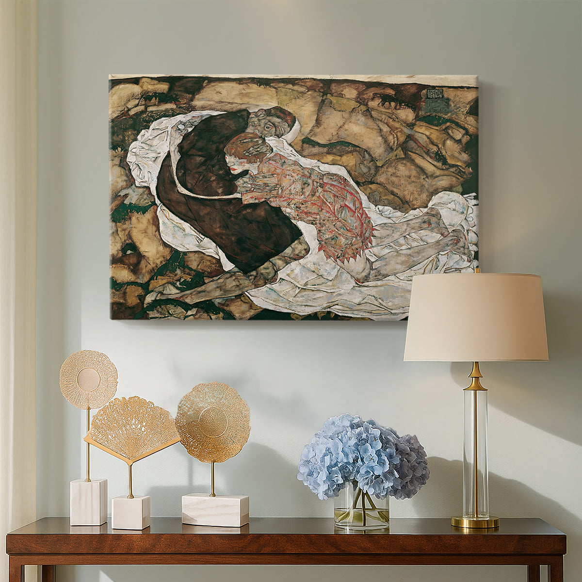 Canvas art print featuring an expressionist painting of human figures in dramatic pose, displayed above a styled console table