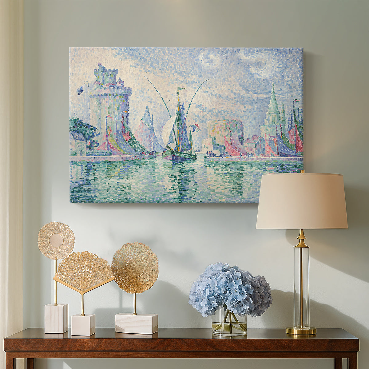 Canvas art print featuring a colorful depiction of towers near water, displayed above a styled console table