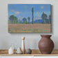 Canvas art print featuring a vibrant meadow scene with flowers and vertical tree forms, styled above a decorative console