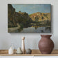Canvas art print featuring a scenic river view bordered by cliffs and vegetation, styled above a decorative console