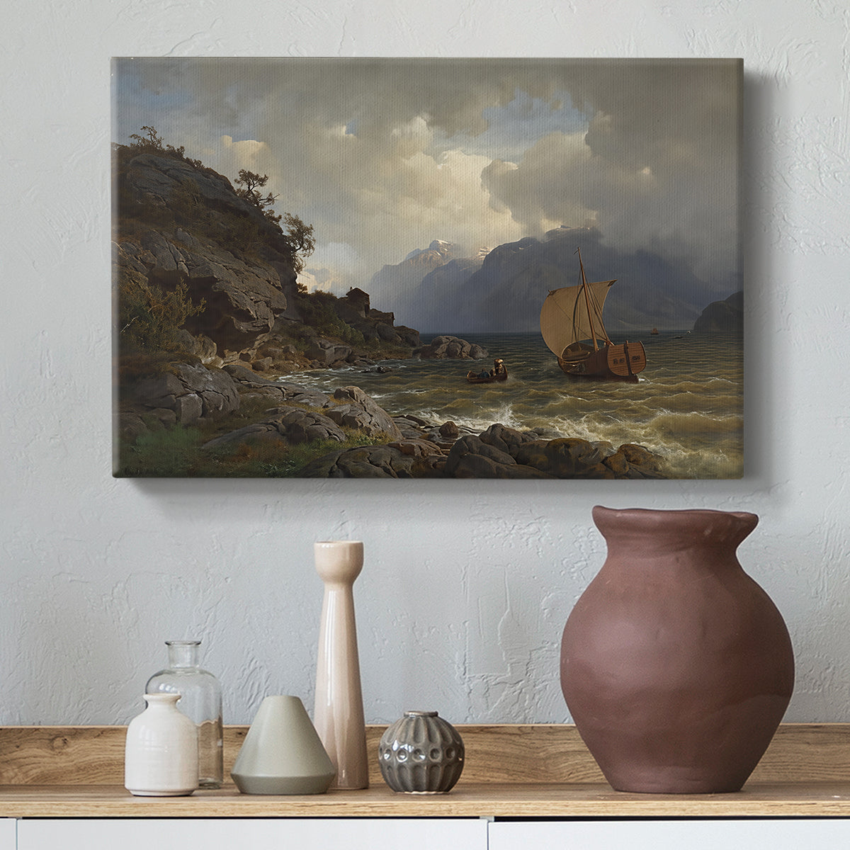 Canvas art print featuring an expansive ocean view with cliffs and maritime activity, styled above a decorative console