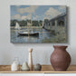 Canvas art print featuring a calm waterway with bridge structure and leisure boats, styled above a decorative console