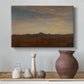 Canvas art print featuring a romantic landscape with layered terrain and soft evening light, styled above a decorative console