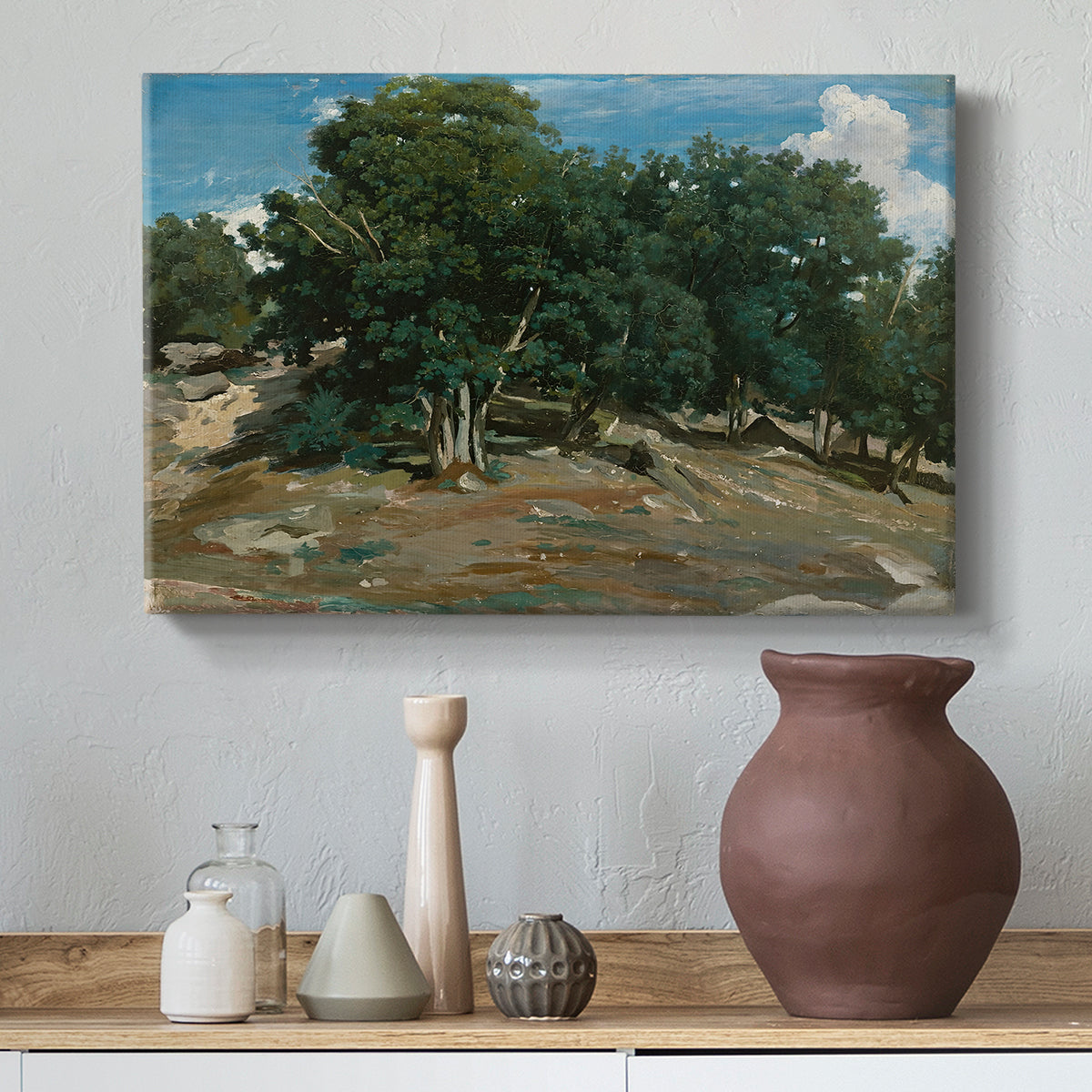 Canvas art print featuring a natural setting with detailed tree forms and soft atmosphere, styled above a decorative console