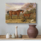 Canvas art print featuring a realistic depiction of several horses standing outdoors, styled above a decorative console