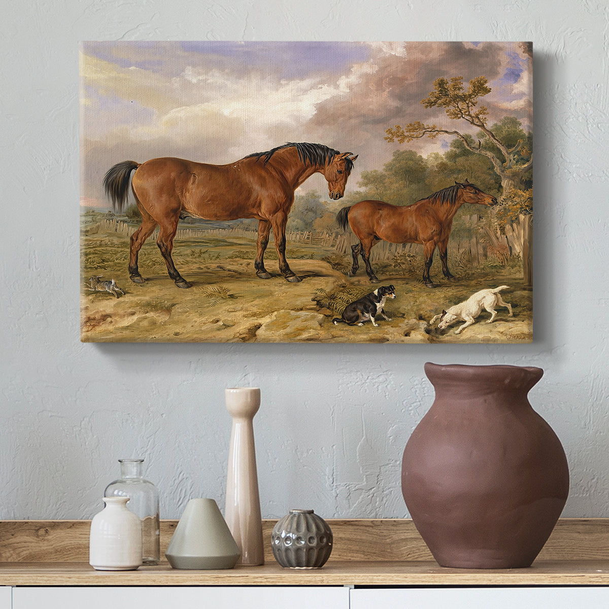 Canvas art print featuring a realistic depiction of several horses standing outdoors, styled above a decorative console