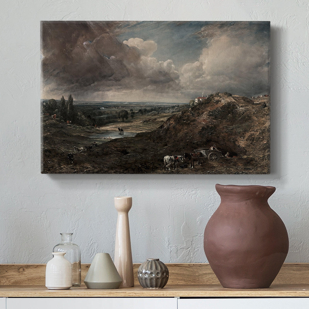 Canvas art print featuring an atmospheric landscape with pond, styled above a decorative console