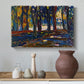 Canvas art print featuring a semi-abstract composition with trees and layered brushwork, styled above a decorative console