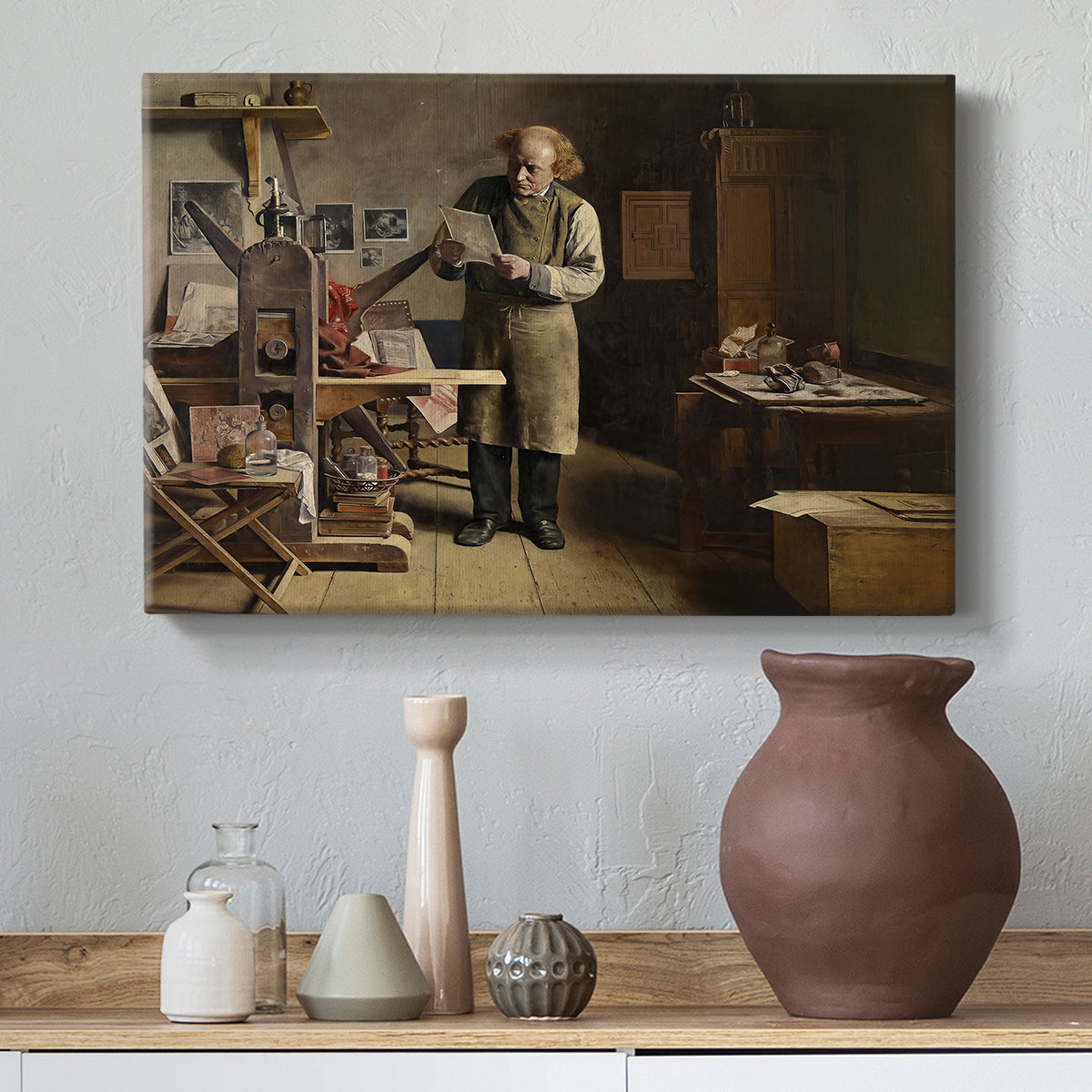 Canvas art print featuring an interior scene with figure focused on printing process, styled above a decorative console