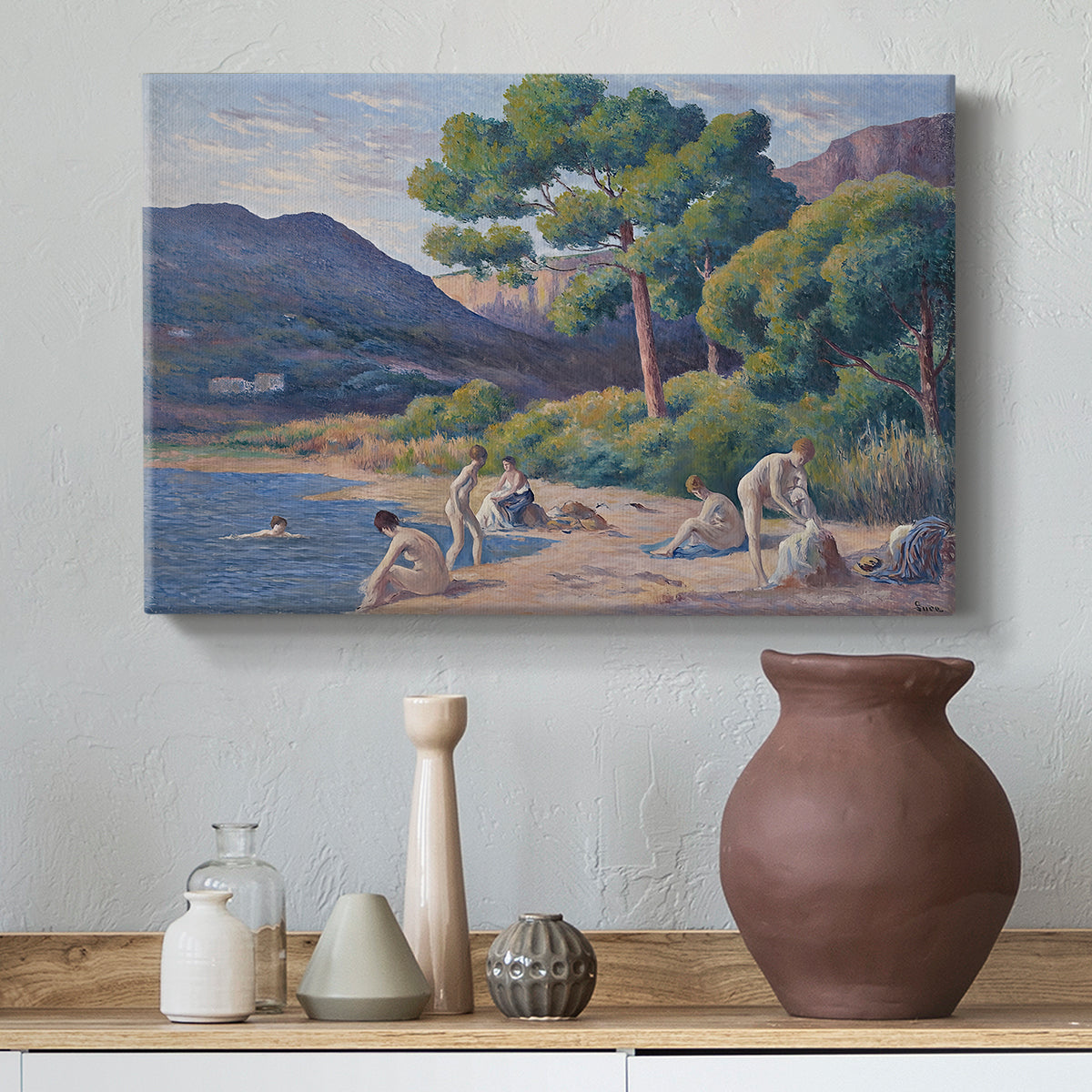 Canvas art print featuring a coastal composition with figures and color texture, styled above a decorative console