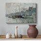 Canvas art print featuring an urban waterway with docked boats and European buildings, styled above a decorative console