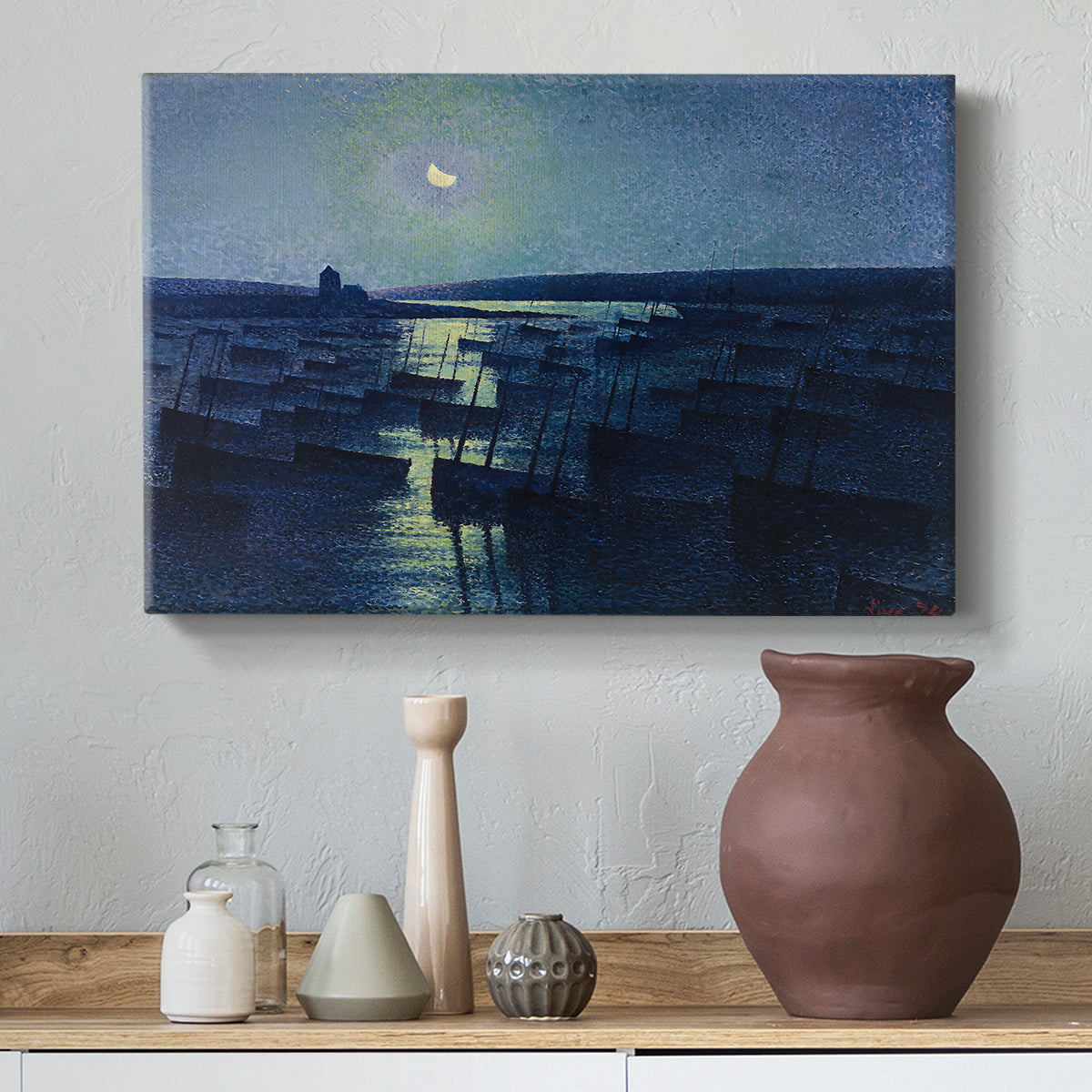 Canvas art print featuring a pointillist night composition with water, styled above a decorative console