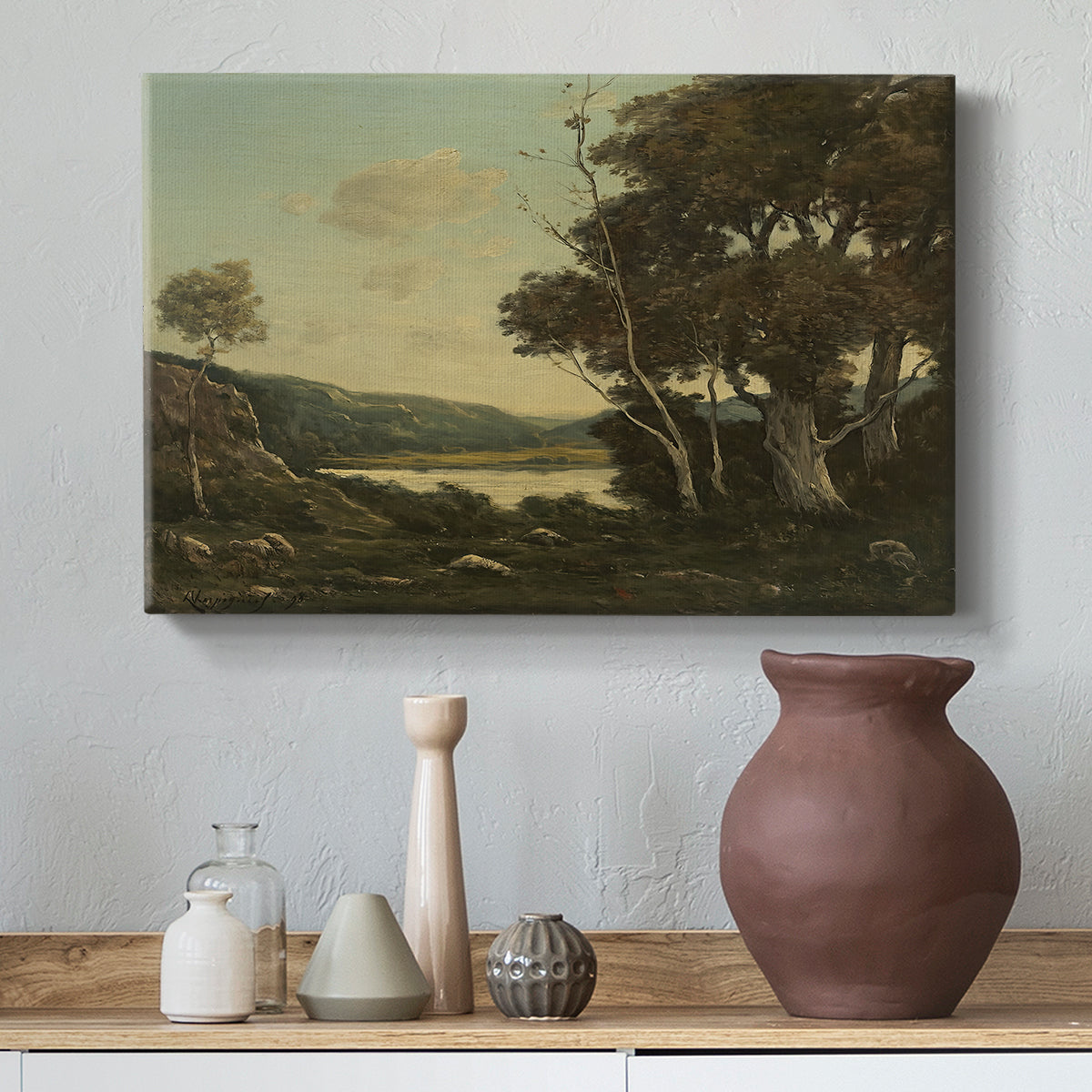 Canvas art print featuring a rural landscape with trees and open space, styled above a decorative console