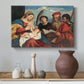Canvas art print featuring a Renaissance group portrait of sacred figures in close arrangement, styled above a decorative console