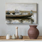 Canvas art print featuring a water composition focused on people within small boat, styled above a decorative console