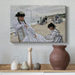 Canvas art print featuring a beach setting with people relaxing under umbrellas, styled above a decorative console