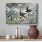 Canvas art print featuring a multiple birds flying together in natural outdoor scene, styled above a decorative console