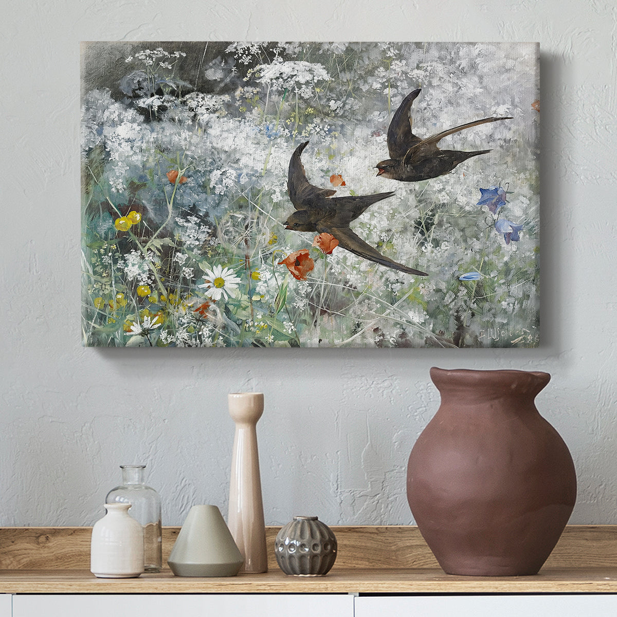 Canvas art print featuring a multiple birds flying together in natural outdoor scene, styled above a decorative console