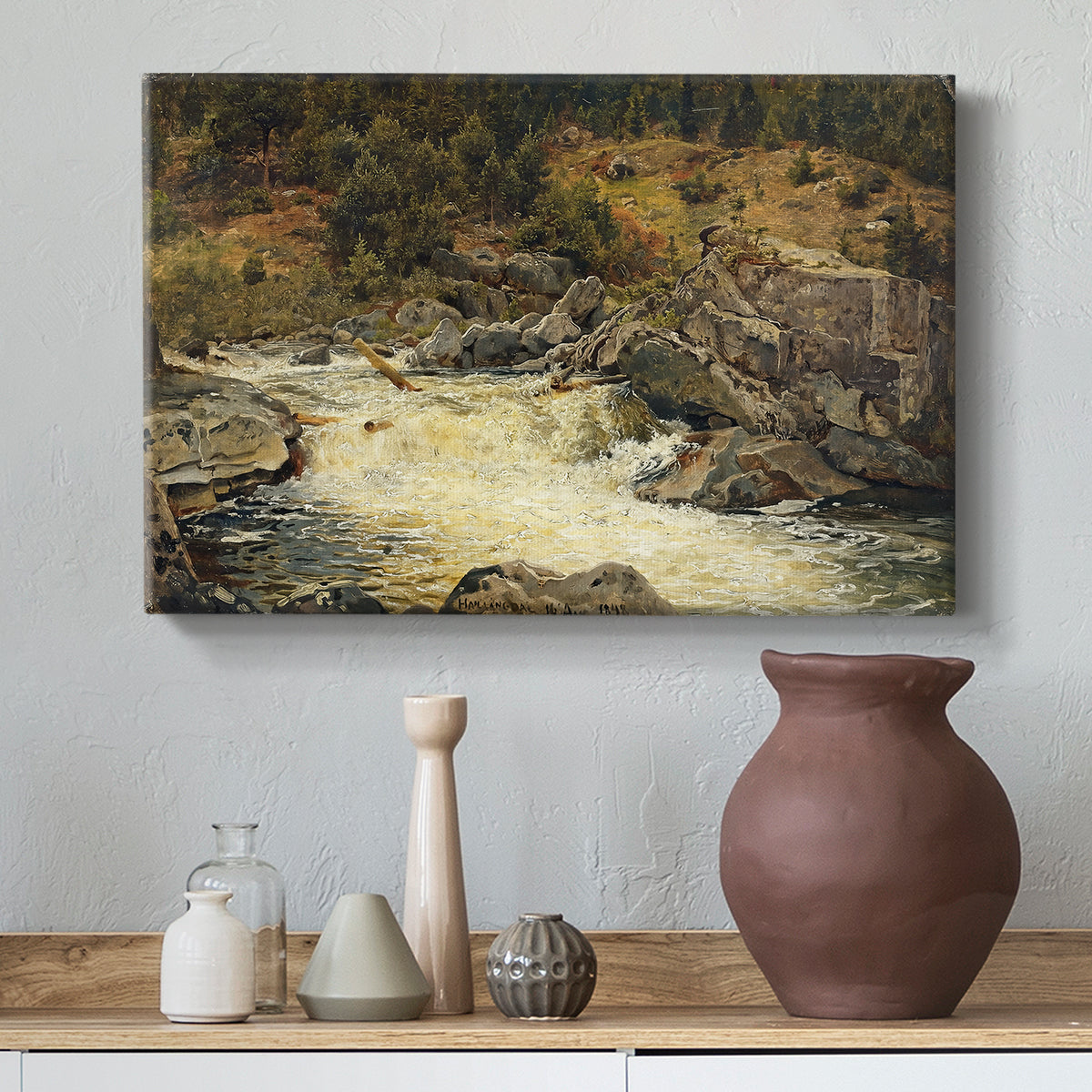 Canvas art print featuring a landscape focused on vertical movement of waterfall, styled above a decorative console