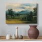Canvas art print featuring a realist landscape with depth, styled above a decorative console