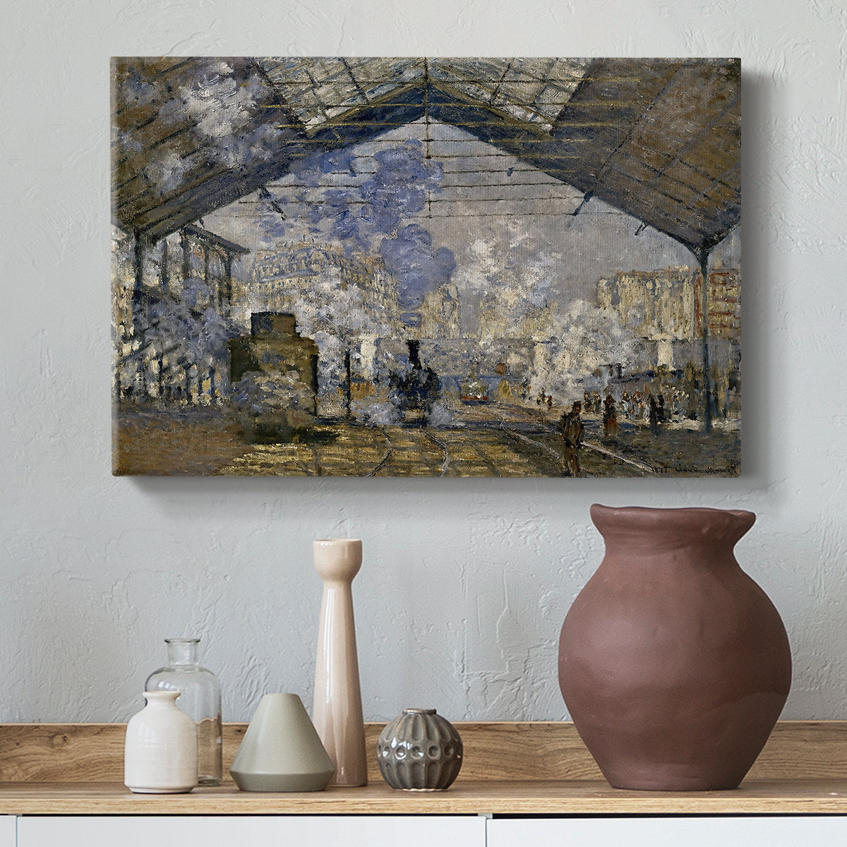 Canvas art print featuring an industrial interior with steam clouds and rail tracks, styled above a decorative console
