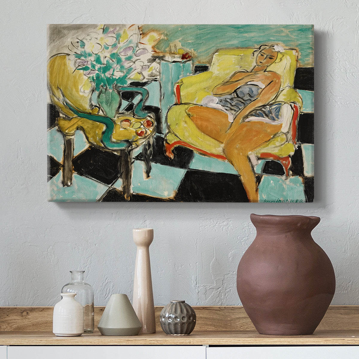 Canvas art print featuring a stylized woman in bold colors against a decorative background, styled above a decorative console