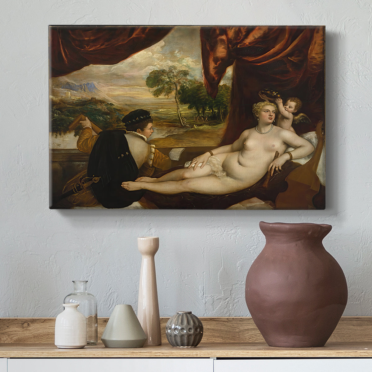 Canvas art print featuring a Renaissance composition of nude figure and lute player outdoors, styled above a decorative console