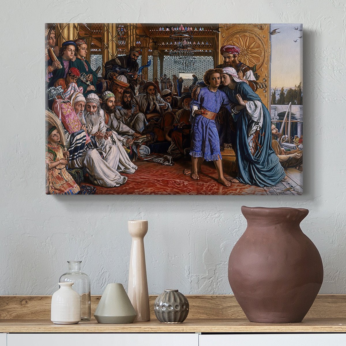 Canvas art print featuring a religious scene with figures arranged in architectural space, styled above a decorative console