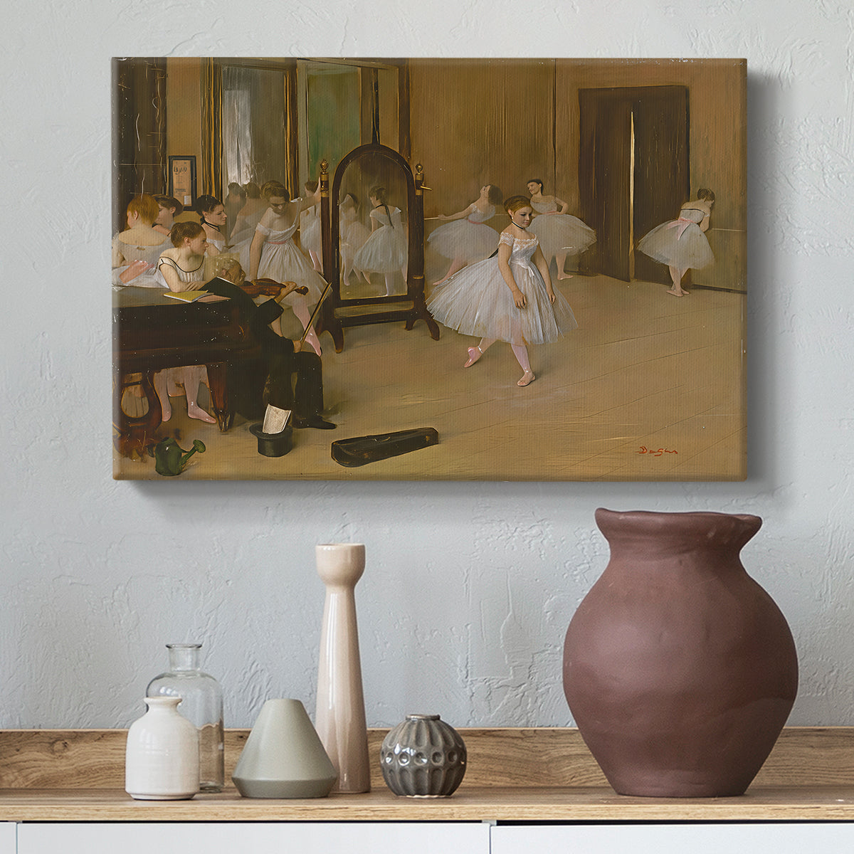 Canvas art print featuring an impressionist interior capturing movement and discipline of dancers, styled above a decorative console