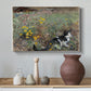 Canvas art print featuring an animal scene of cat hidden in lush meadow vegetation, styled above a decorative console
