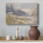 Canvas art print featuring a rural alpine setting with shepherds and open terrain, styled above a decorative console