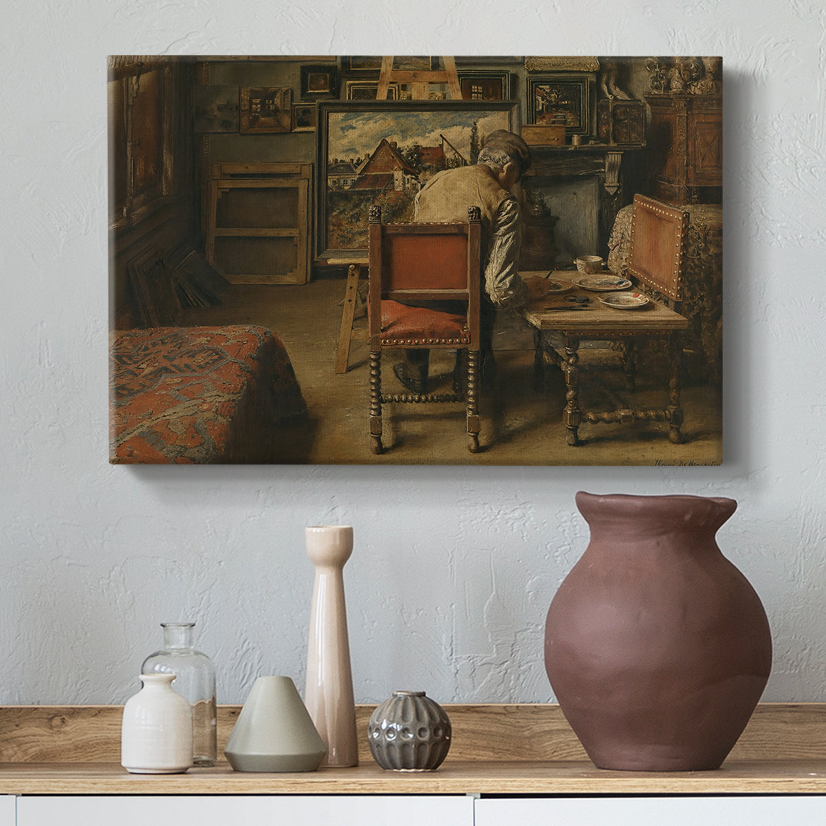 Canvas art print featuring a craftsman focused on detailed work with tools and materials, styled above a decorative console