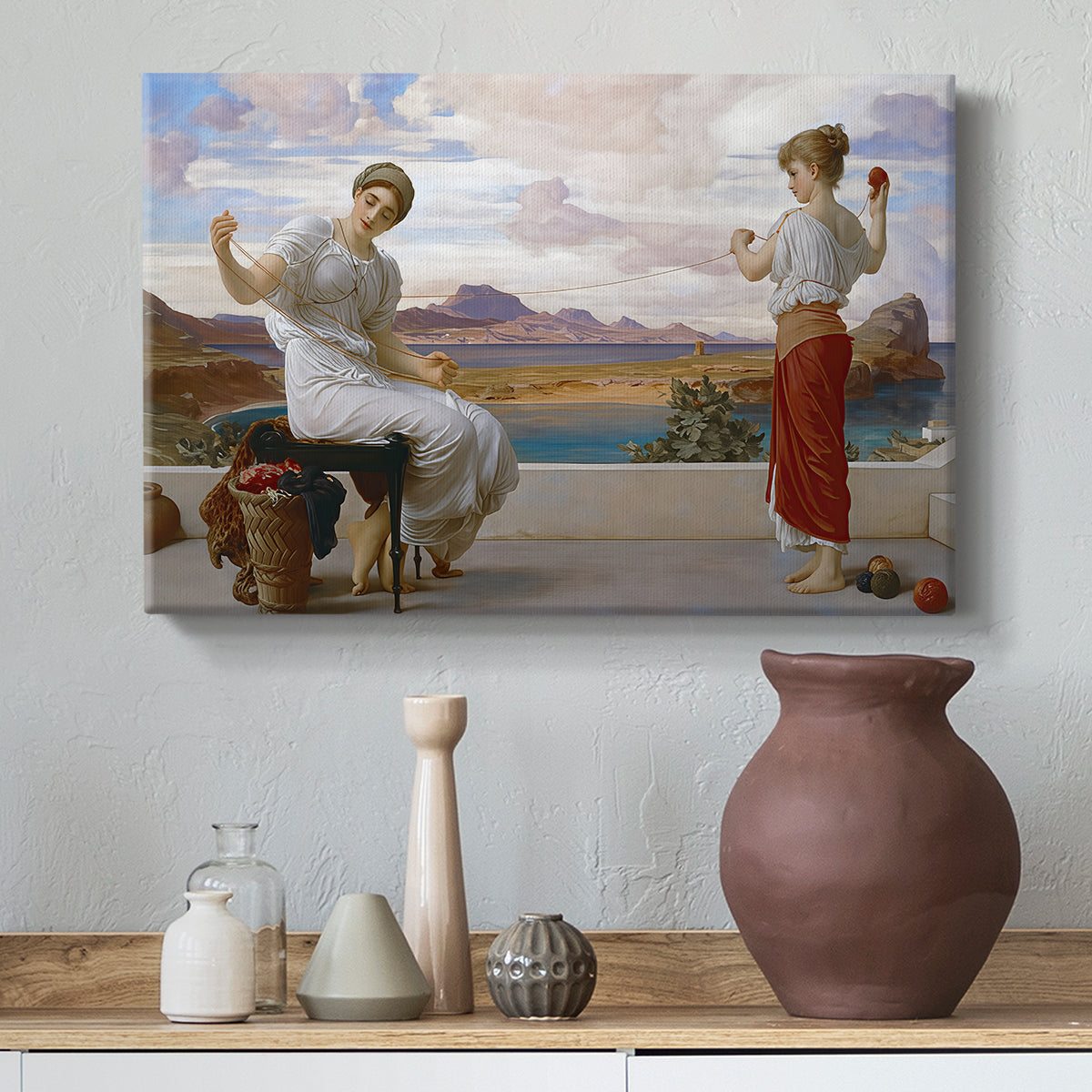 Canvas art print featuring a classical scene of figures winding thread together, styled above a decorative console