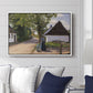 Danish Village Street with Woman and Milkman, 1880 - Floater Framed Canvas Print