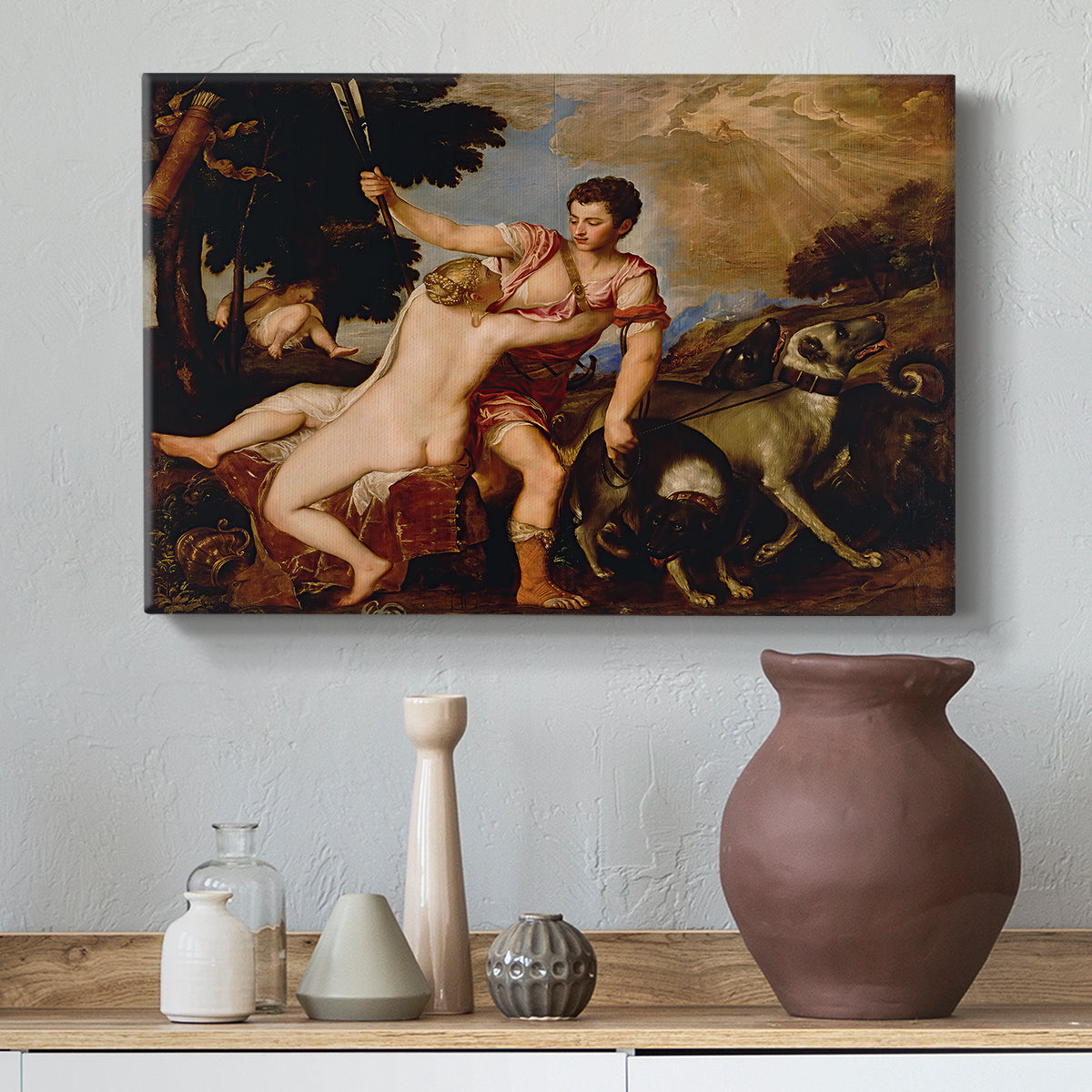 Canvas art print featuring an emotional figure composition with hunting dogs and movement, styled above a decorative console