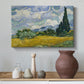 Canvas art print featuring a post-impressionist countryside scene with crops and sky, styled above a decorative console